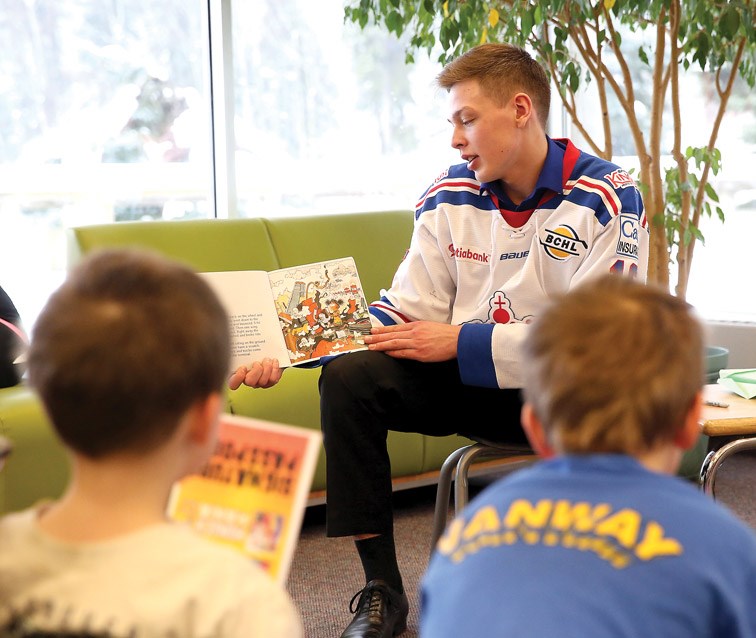 It was Munsch Mania with the Prince George Spruce Kings at the Bob Harkins Branch of the Prince George Public Library on Saturday. Spruce Kings Kyle Johnson reads Angela's Airplane to a group of kids as part of Family Literacy Day at the library. Citizen Photo by James Doyle January 23, 2016