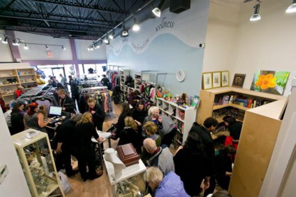 The new West Shore Women In Need store was thronged with shoppers Thursday on the day it celebrated its grand opening.