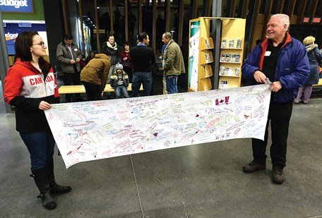 Supporters gather in Prince George Airport Thursday evening to welcome the third Syrian family to arrive in Prince George. Citizen photo by Brent Braaten Feb 4 2016