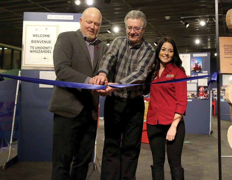From left, Anthony Everett, Chair of the 2015 Canada Winter Games, Mayor Lyn Hall, and Alyssa Tobin, acting curator for The Exploration Place cut the ribbon to officlally open the We Are Winter exhibit at The Exploration Place. The exhibit will highlight some of the exciting moments of the 2015 Canada Winter Games and will open to the public on Tuesday and run until June 2016. Citizen Photo by James Doyle February 8, 2016