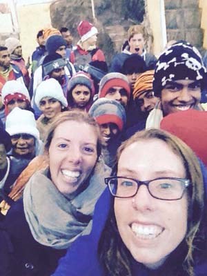 Erika and Cait Van Vliet take a selfie in Nepal. During their trip, which still has more than two months to go, they attended a sunrise ceremony in India. By the end of their trip, they will have travelled through Southeast Asia, India, Nepal, Central Asia, Europe and the Middle East. In Sri Lanka, an entire village came out to help the sisters fix their moped when it broke down and refused to accept any payment.