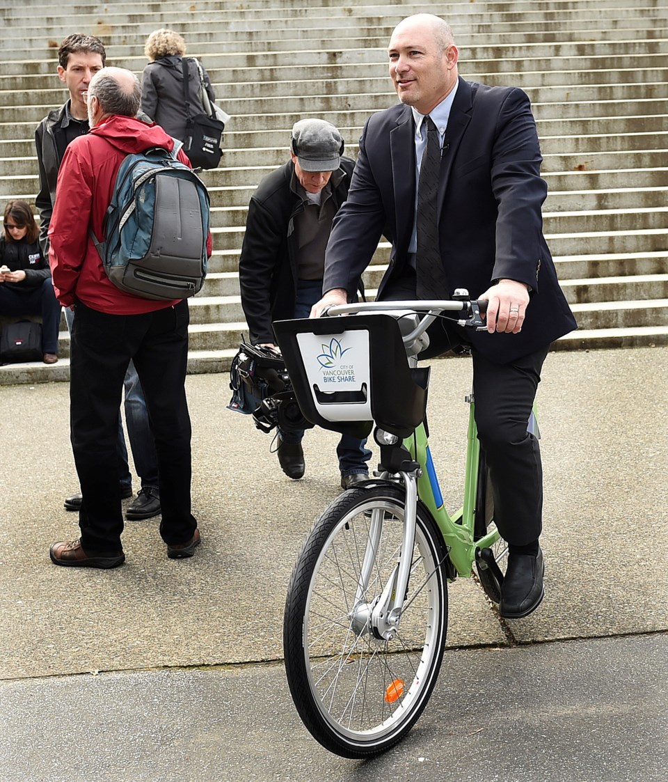 Josh Squire, founder and CEO of CycleHop Corp. Canada, was at city hall Wednesday to demonstrate how