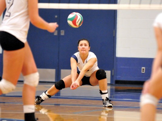 Capilano University's Jacqueline Caverly, pictured here, and her twin brother Dan are leading their respective Pacwest leagues in digs. The Blues are off to the provincial championships this weekend.