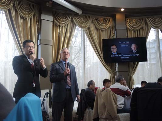 Businessman Peter Liu, left, opens up his Q & A on Friday with Coun. Bill McNulty at the China House Seafood Restaurant in Golden Village