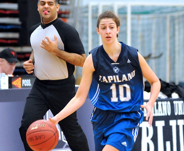 Capilano University leading scorer Michelle Errico takes control during a recent PacWest game. Errico will end her college career on her home court this weekend with sister Sherrie by her side. photo by Paul McGrath, North Shore News