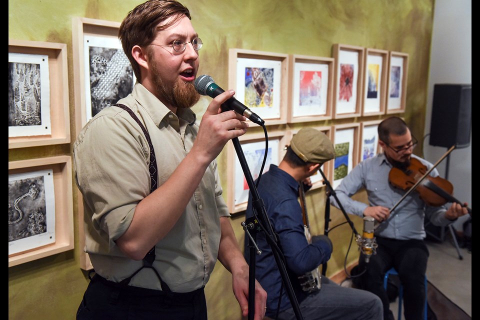 Vancouver-based square dance caller Paul Silveria taught both kids and adults alike how to square dance during a free workshop at ArtStarts Saturday. Silveria was joined by musicians Christopher Suen on banjo and Kori Miyanishi on fiddle. Photograph by: Rebecca Blissett