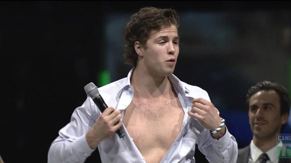 Ben Hutton opens up his shirt