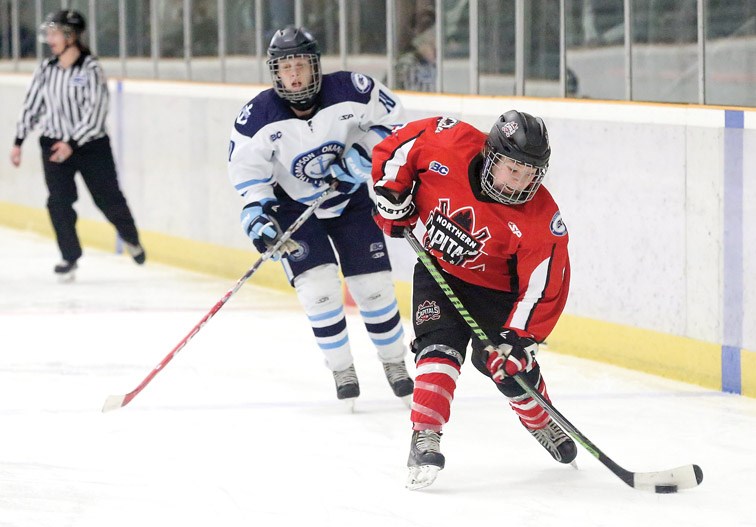 Northern Capitals Caily Mellott takes a slapshot on Saturday in Kin 2. The Thompson-Okanagan Lakers and Capitals met in the second game of the best of three series between the two teams. The Lakers lead the series 1-0 with a 3-2 win in OT on Friday. Citizen Photo by James Doyle March 5, 2016