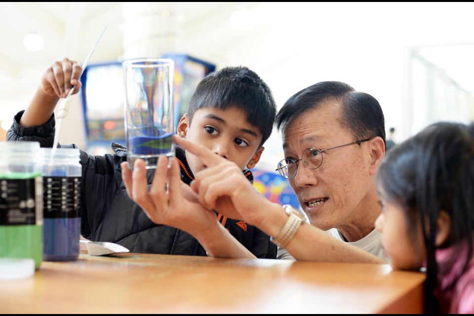 Retiree Roger Lee is a self-taught sand artist. He shared his passion with children at the New West Craft Sand Art workshop at the River Market.