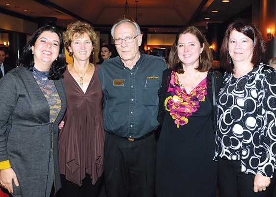 FANS board of directors members Sepideh Sarrafpour, board advisor Margo Gram, Roger Nelson, Lori Phillips and president Jacquie Morgan greet guests.