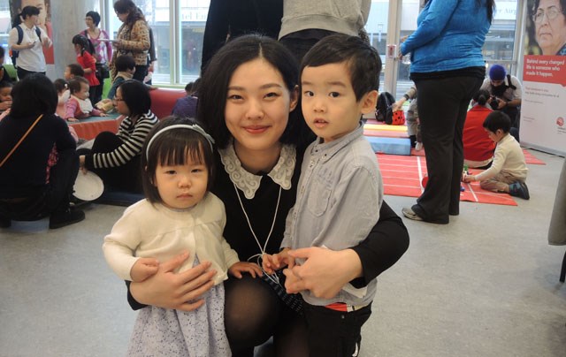 Lea Li, who immigrated from China three years ago, says programs run through Touchstone and the school district have been critical in helping her two toddlers integrate and prepare for kindergaten.