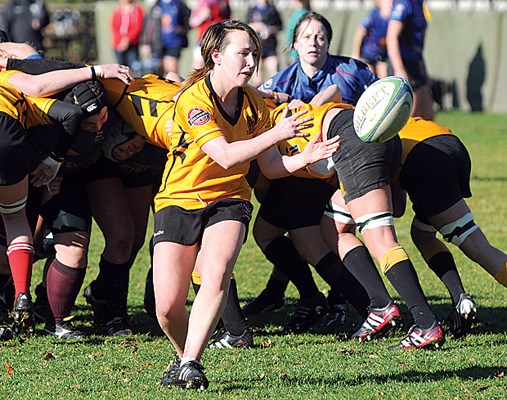 Capilano Rugby Club Premier women's team (yellow) in action against United (blue)