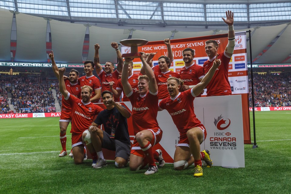 Team Canada, including North Shore players Harry Jones (bottom row right) and Adam Zaruba (top row right) celebrate Canada's win over France in the Bowl final of the first-ever World Rugby Sevens Series tournament held in Canada.