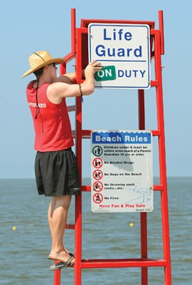 Spencer Dicaire gets set to take his seat in one of two lifeguard chairs at West Vancouver's Ambleside Park.