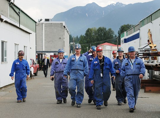 Seaspan employees walk to a press conference where they're updated on the financial contributions of the Province of BC and BC Ferries are making to their current bid.