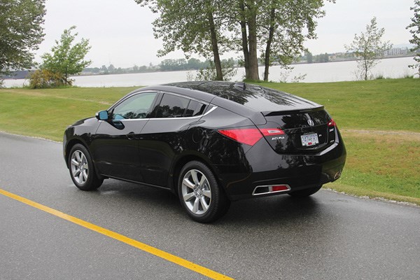 Enlarged front doors and concealed rear door handles give the ZDX its coupe-like appearance.