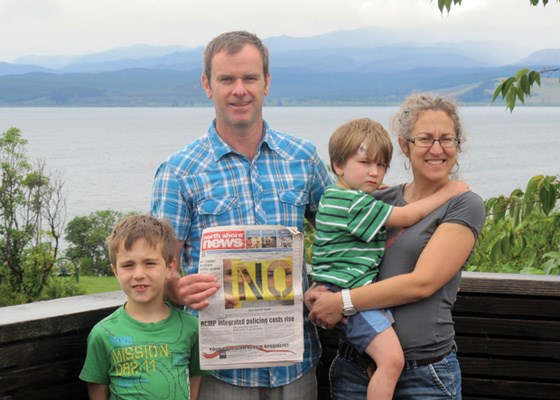 Connor, Mark and Dylan Ritchie and Lisa Mingo take in the scenery at Lake Taupo, New Zealand.