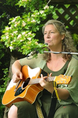 Lora Bird performed songs from her CD, Open Eyes, in the backyard garden of Tara Walsh on East Keith Road in North Vancouver.