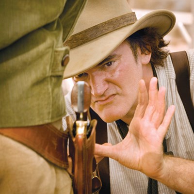 Quentin Tarantino directs a scene in Django Unchained. His latest opens on Christmas Day.