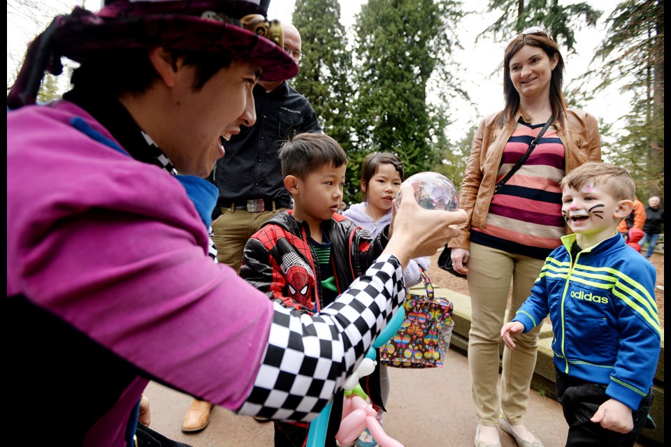 Zinedine Jukic, 4, is wowed by Vancouver Circus School performer Nigel Wakita.