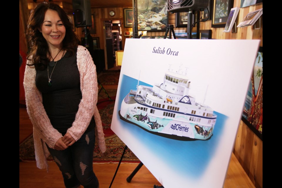 Darlene Gait, an artist from the Esquimalt First Nation, with her winning motif for B.C. Ferries’ new vessel, Salish Orca. Her designs incorporate images of orcas and wolves.