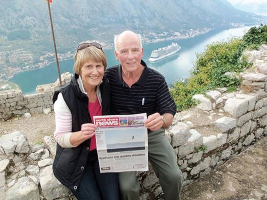 Val and Rob Pellatt enjoy the view in the Mediterranean port of Kotor, Montenegro, while on a cruise (the ship is visible in the background).