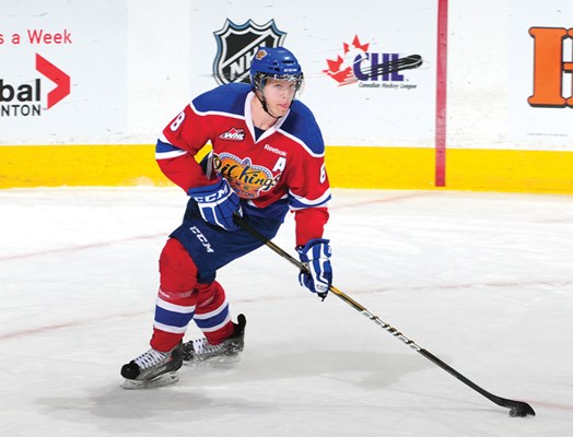 Middle child Griffin Reinhart plays for the Edmonton Oil Kings and is projected to be a first-round NHL draft pick this year.