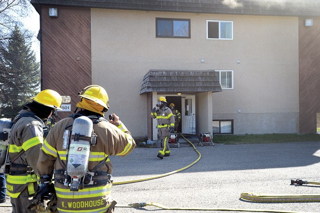 A blaze broke out in a second-floor suite in the three-storey complex at Westridge Place in the 4500-block of Azure Avenue, off Foothills Blvd Thursday morning. Citizen photo by Brent Braaten April 7 2016