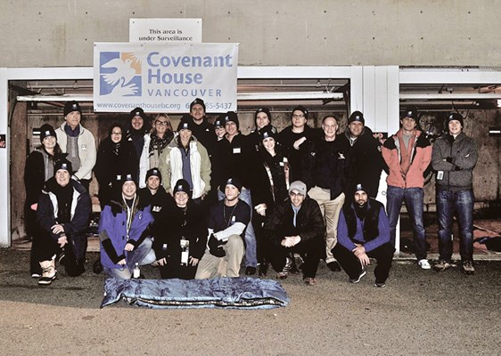 The inaugural Vancouver Sleep Out group gathers before turning in.