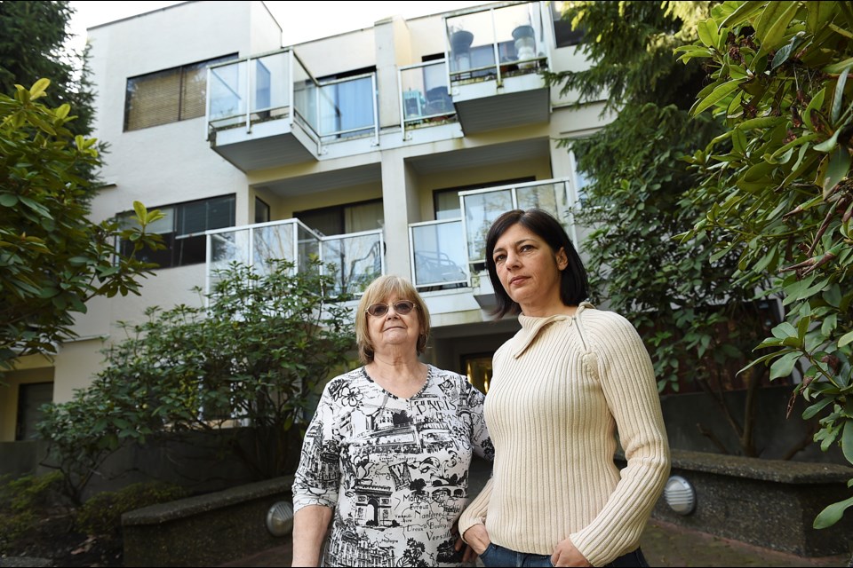 Eva Vladinski and Ulrike Rodrigues have spent the last few years fighting unwanted Airbnb units in their Mount Pleasant condo building. Until recently, 10 former market rental suites, all of which are owned by a real estate agent and various members of his family, were listed on Airbnb as short-term rentals. Photo Dan Toulgoet.