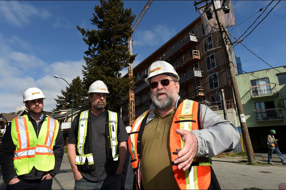 King Edward Villa at 1568 East King Edward is aiming for LEED Platinum certification. Paul Warwick (right) is senior project manager of the builder — Performance Construction. Photo Dan Toulgoet