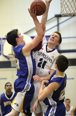 AAABBall HansvsSent01; The Handsworth Royals took on the Sentinel Sparts in a AAA Mens Basketball game Monday night at Sentinel.the Spartans were victorious 69-65.