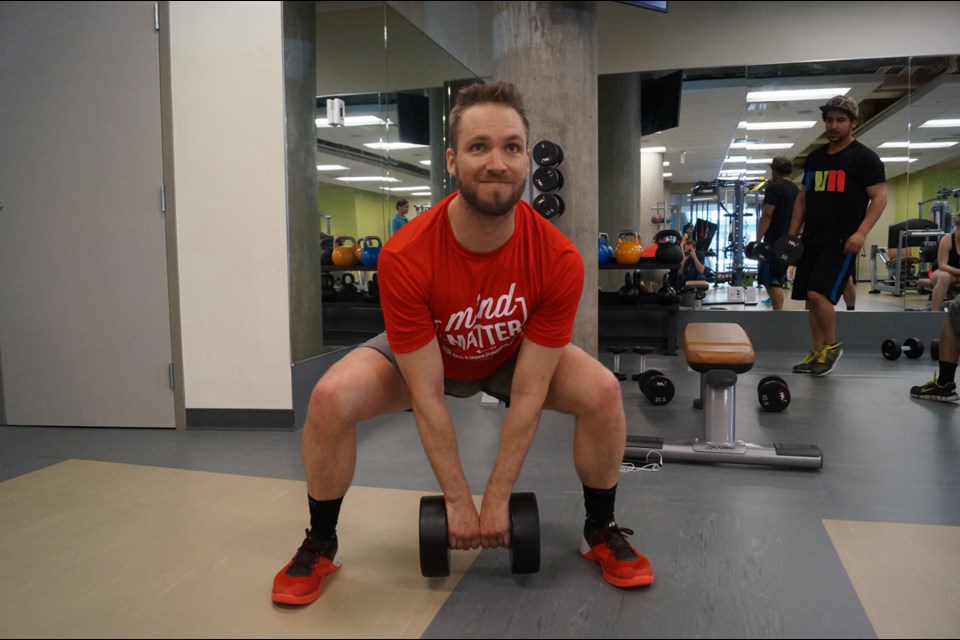 News sales representative Collin Neal in the midst of an intense workout at City Centre Community Centre