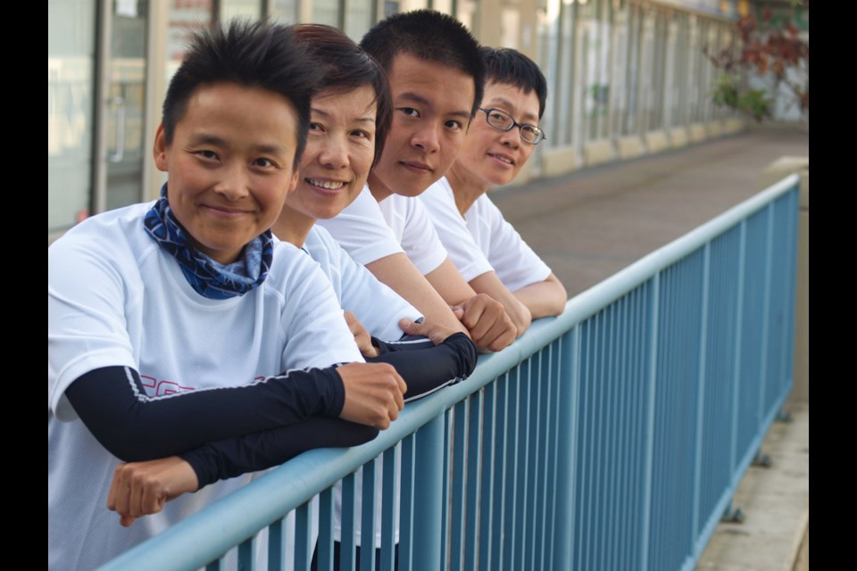 Esther Ho, Shan Lee, Jason Chiang and Amy Tam hope to complete a 250-kilometre race in African desert sand from May 1 to 7. Not pictured are teammates Jason Ng and K.K. Lee. Photo by Matthew Hoekstra/Special to the News