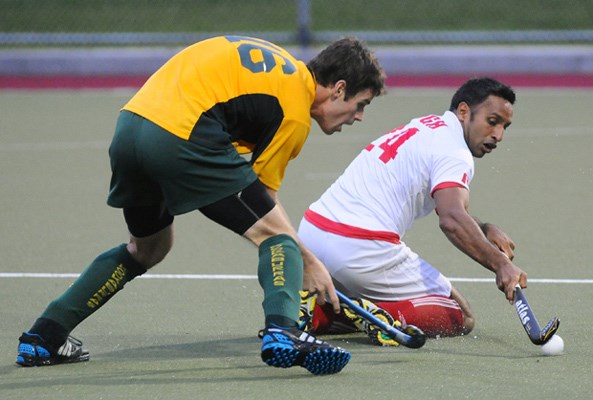 The Canadian Men's field hockey team went up against Australia at Rutledge Field Tuesday night, September 13th as part of an exhibition series. Australia's Jake Stacy tries to check Canada's Gabbar Singh.