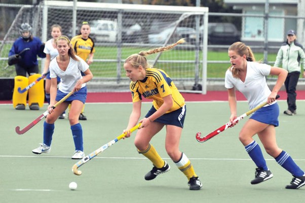 Collingwood's Leah Frome takes control in the North Shore senior girls field hockey championship game against Handsworth. Collingwood upset the Royals 2-1 and both teams went on to win their respective divisions at the provincial championships.