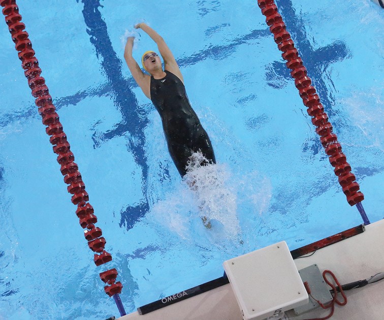 Kleanza Cathers, 16, takes off from the starting block as she competes in the Girls 15 and over 200m Medley Relay on Saturday at the Prince George Aquatic Centre during the Prince George Barracudas Dental Moose Meet. Citizen Photo by James Doyle April 16, 2016