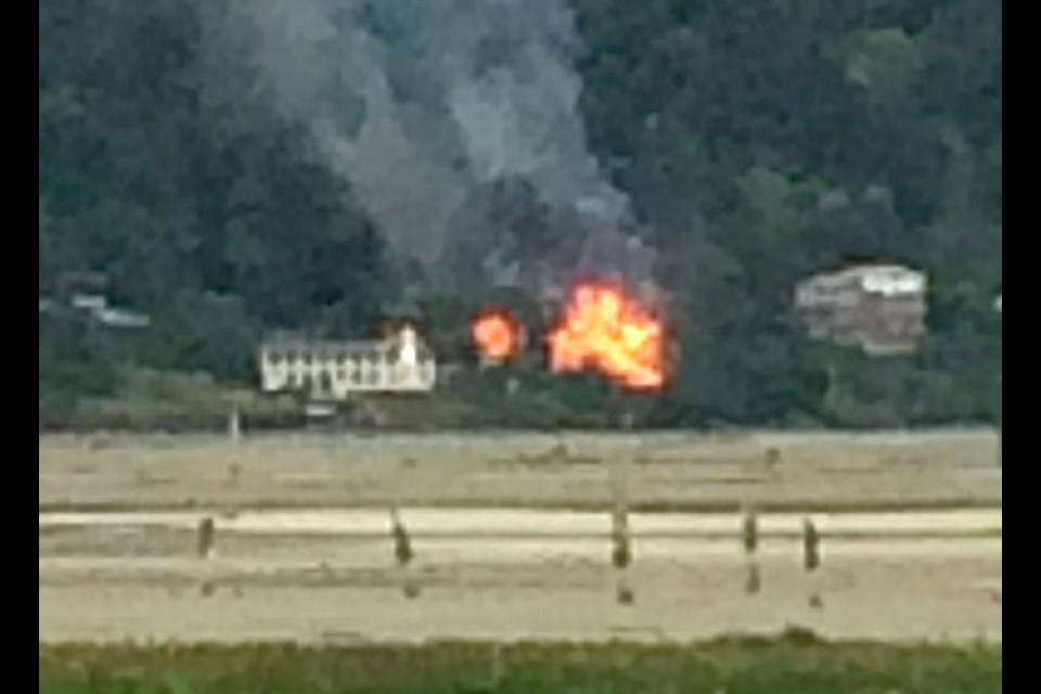 Fire destroyed or damaged three houses on Khenipsen Road across from the Cowichan Bay townsite.