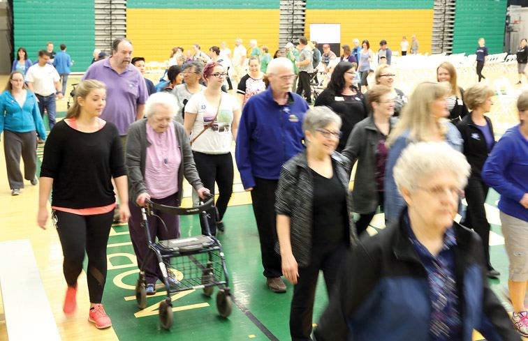 Walkers make their way around the gymnasium at Northern Sport Centre on Sunday. Over 100 people participated in the Investors Group Walk for Alzheimer's to help raise awareness and much-needed funds that can make a difference in the lives of affected Canadians. Citizen Photo by James Doyle      May 1, 2016