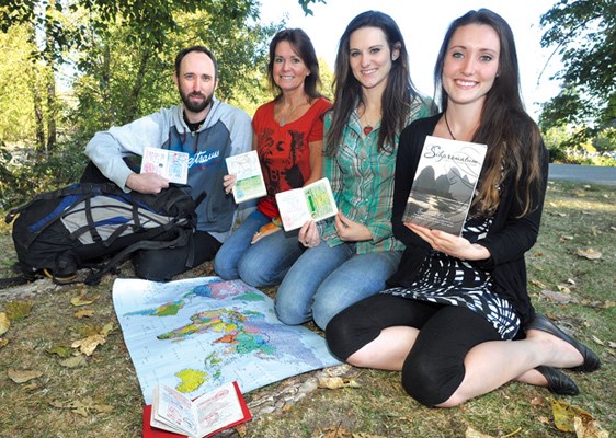 Ammon Watkins (left), his mother Maggie and sisters Breanna and Savannah travelled around the globe on a four-year family journey, resulting in many interesting passport stamps. Savannah Watkins chronicled the beginning of the journey in her book, Sihpromatum - I grew my boobs in China.