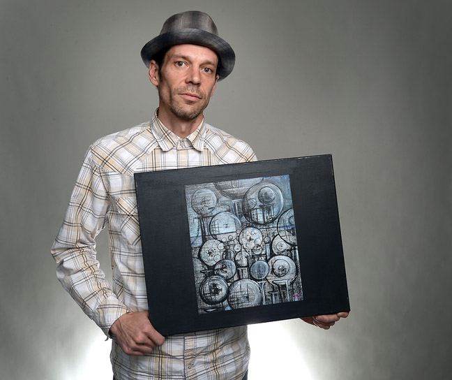 Artist Trevor Stanley with the letter I. Citizen photo by Brent Braaten   April 27 2016