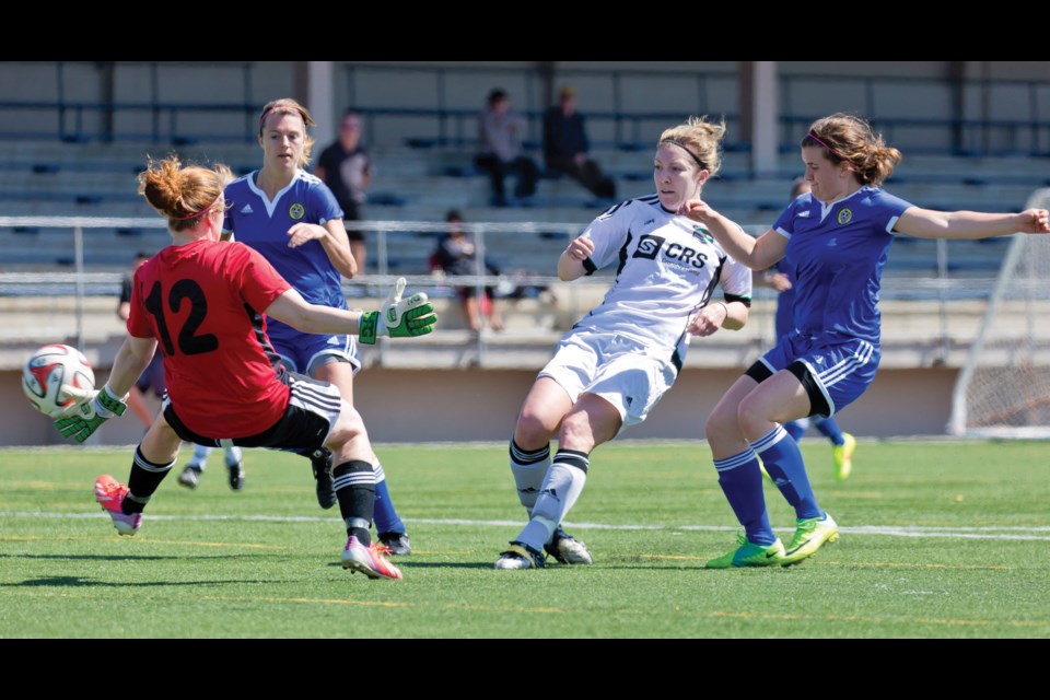 Caitlin Davie fires home one of her two goals in Richmond FC's 5-0 win over Abbotsford United in Provincial "A" Cup quarter-final action.