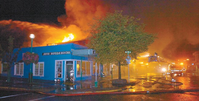 Sunday morning at approximately 1:30 AM a suspected arson took place behind B&B Music. The fire destroyed the long-standing music store and the Java Mugga Mocha coffee shop.
B and B fire 1, Tuesday, David Mah