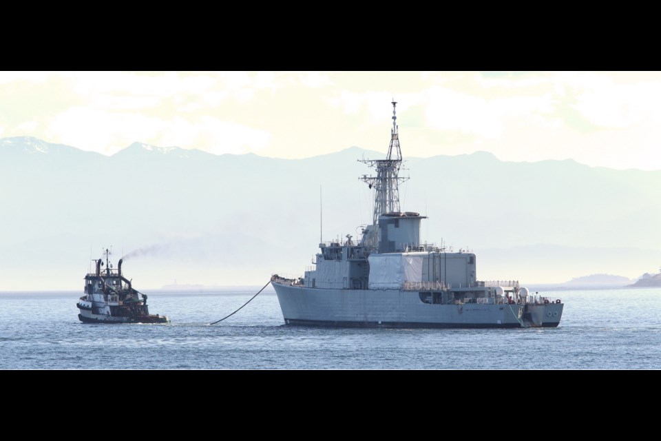 The decommissioned Royal Canadian Navy ship HMCS Algonquin is towed out of CFB Esquimalt in May for a 7,600 nautical-mile journey to Nova Scotia, where it was scrapped at a facility in Antigonish.