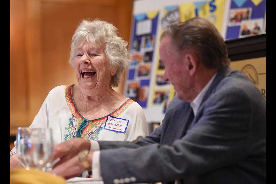 Enid Heuser and Bob Kerr share a laugh. Photo Dan Toulgoet