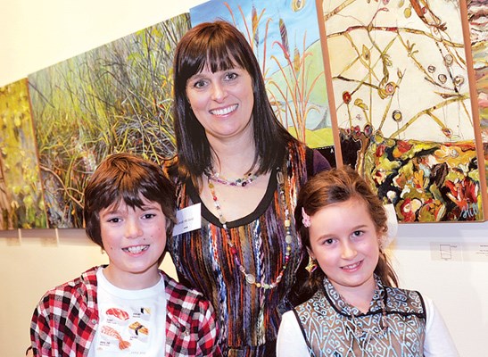 Exhibiting artist Sarah Hill David with children Sam and Michaela