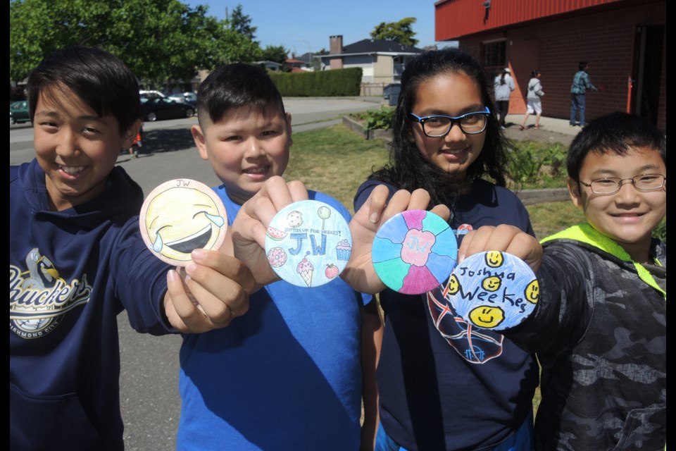 The DeBeck elementary Me to We Club made 200 personalized buttons in support of fellow student Joshua Weekes, 6, who is battling leukemia.