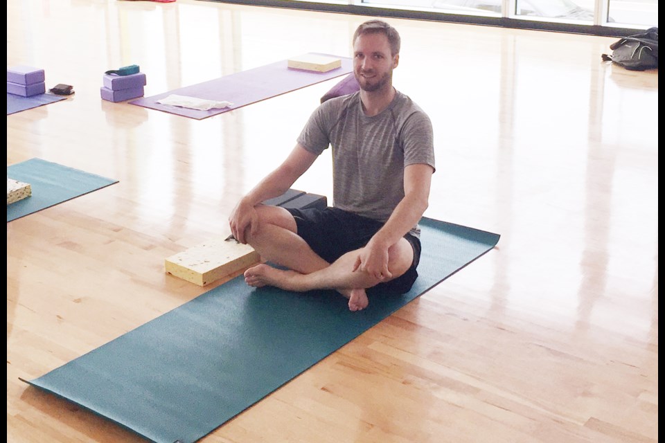 Team Apres Ski’s Collin Neal prepares for a power yoga session as he bids to maintain his healthy lead over rival, Mongoose. Photo by Gabrielle Payne