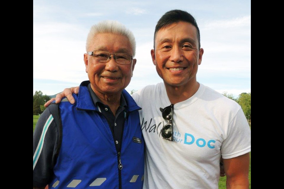 Davidicus Wong with his dad, Tom, at the annual Walk With Your Doc event in Burnaby.