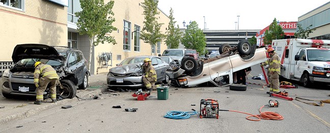 A truck flipped over on Brunswick Street between 3rd Avenue and 4th Avenue Tuesday morning. Citizen photo by Brent Braaten May 3 2016